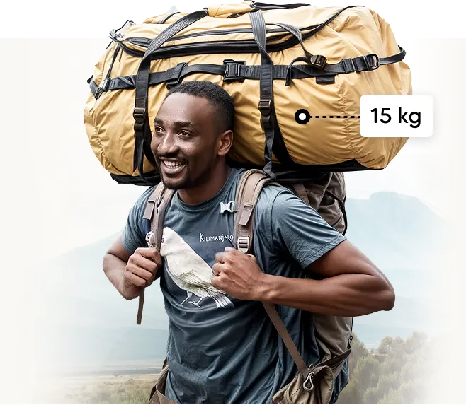 Nosač na Kilimanjaru nosi ekspedicijsku duffel torbu od 15 kg Nosač na Kilimanjaru nosi ekspedicijsku duffel torbu od 15 kg